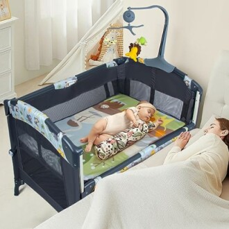 Baby sleeping in a crib beside a resting mother.