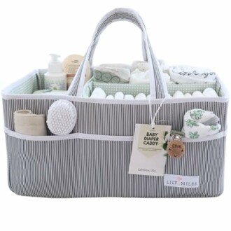 Striped baby diaper caddy with toiletries and essentials.