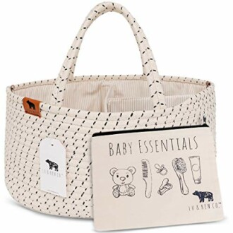 Woven baby essentials basket with handles and organizer