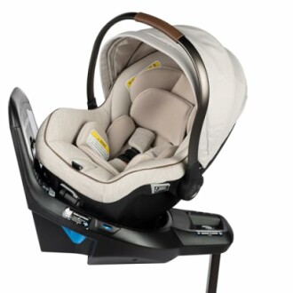 Infant car seat with base, showcasing the overall design and features.