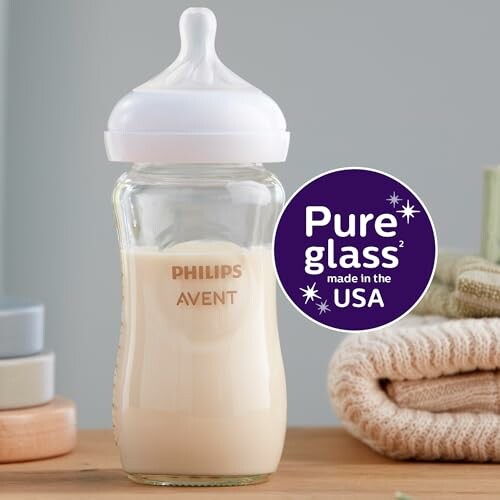 Philips Avent glass baby bottle with milk and Pure Glass USA label