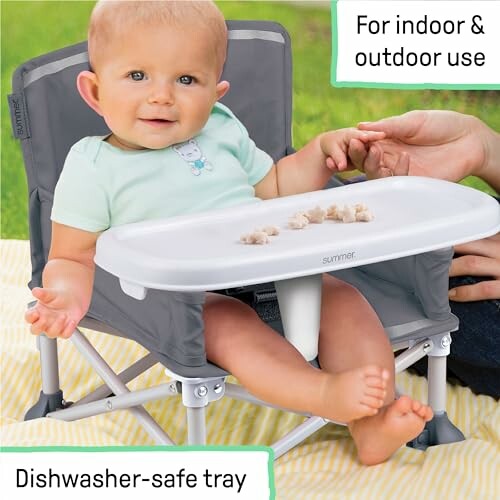 Baby sitting in a portable high chair with a dishwasher-safe tray, suitable for indoor and outdoor use.