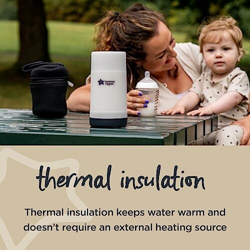 Mother and child with thermal insulation bottle outdoors.