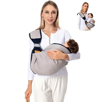 Woman holding a baby in a carrier sling