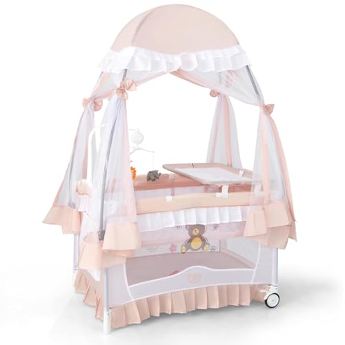 BABY JOY 4 in 1 Pack and Play with Canopy, Portable Baby Playard Bedside Sleeper with Side Zipper Entrance, Wheels & Brake, Baby Girl Pink Bassinet Crib from Newborn to Toddler